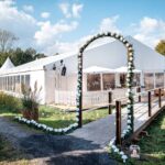 Garden wedding with celebration in the large wedding tent