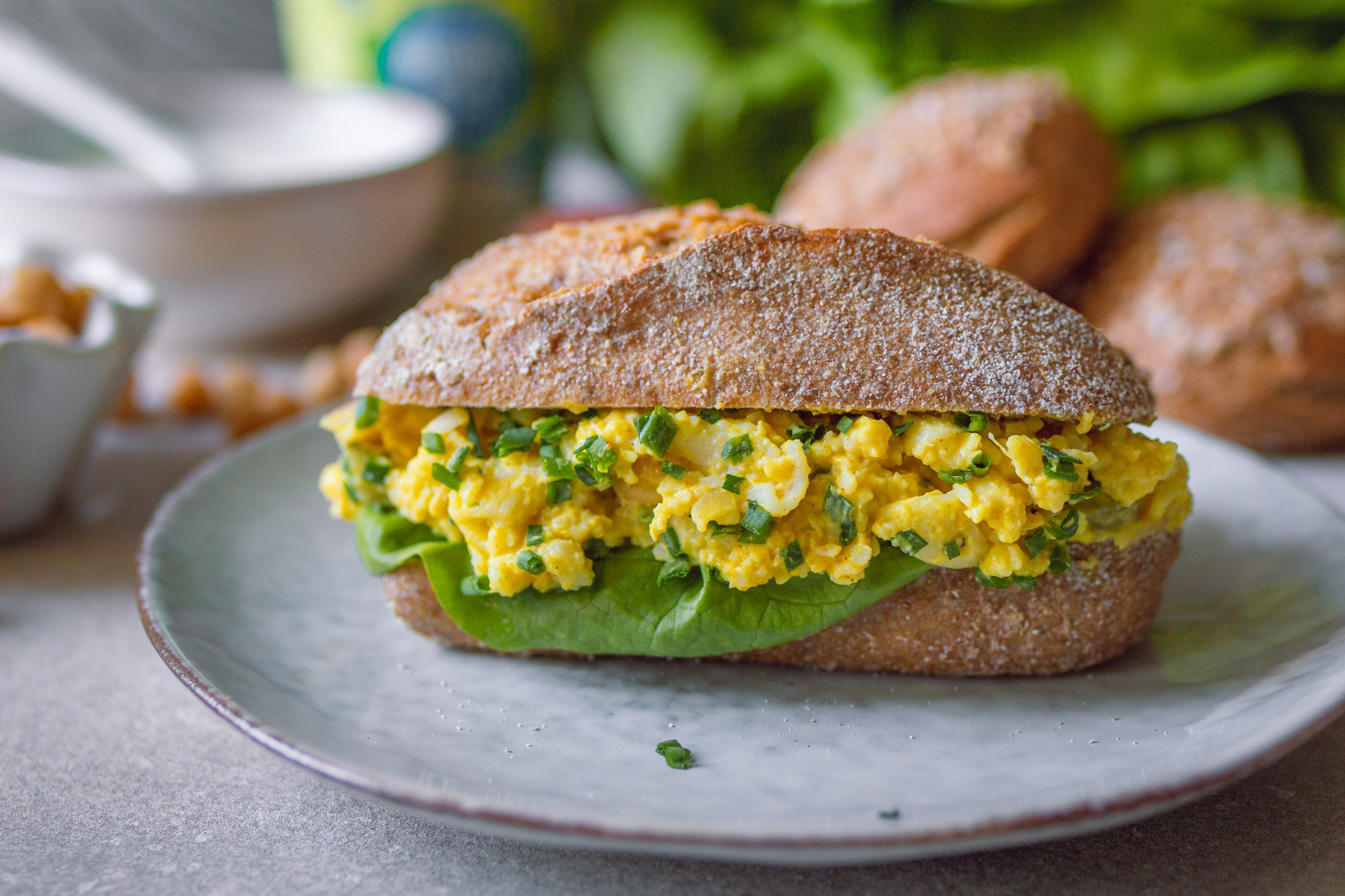 Vegan egg salad in a roll