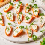 Filled mini peppers (like carrots) as finger food for Easter.