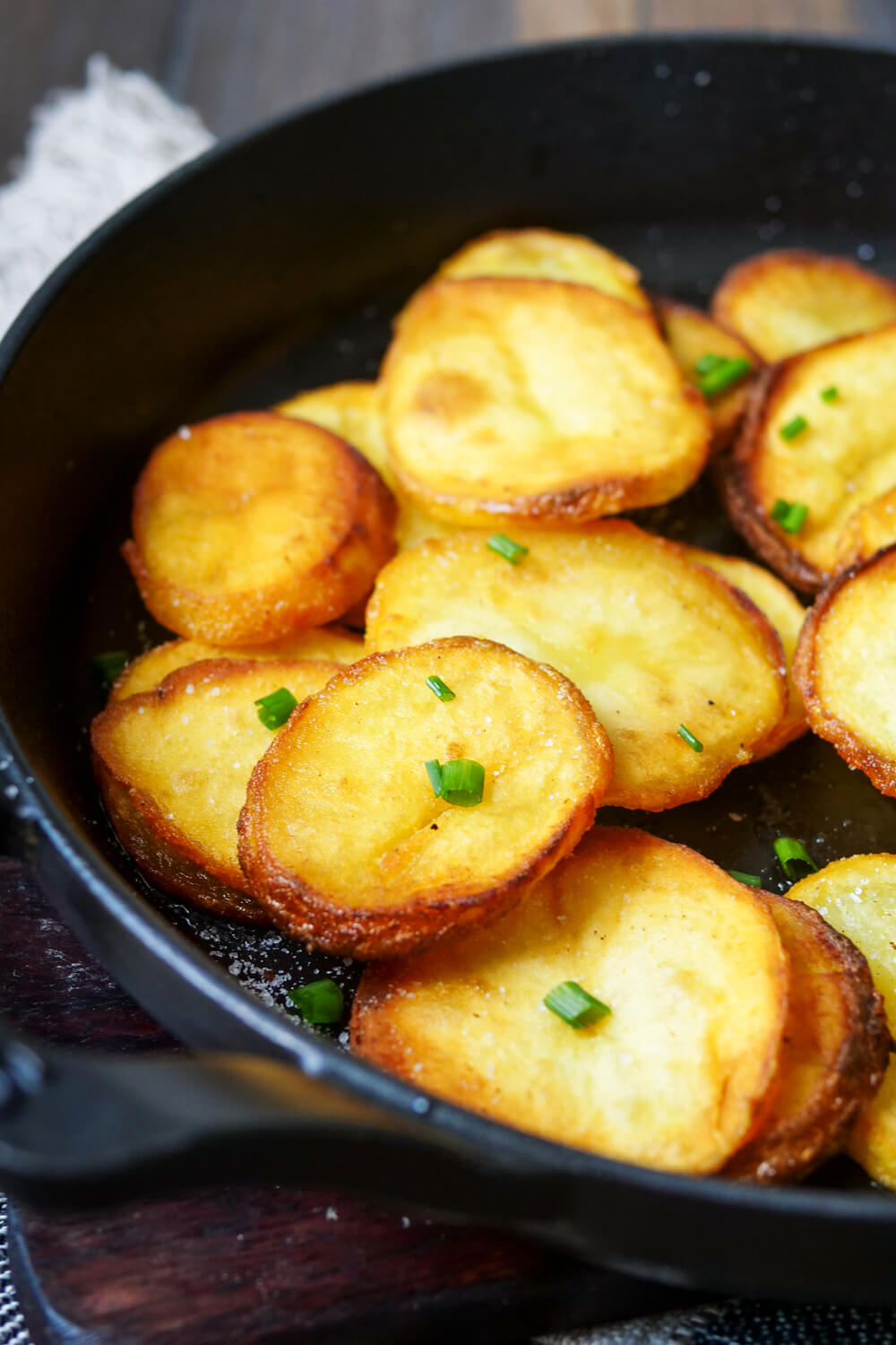 Crispy fried potatoes in the pan
