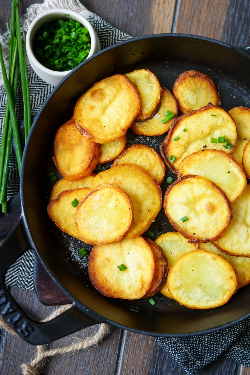 Crispy fried potatoes in the pan