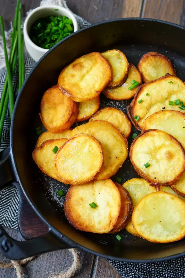Crispy fried potatoes in the pan