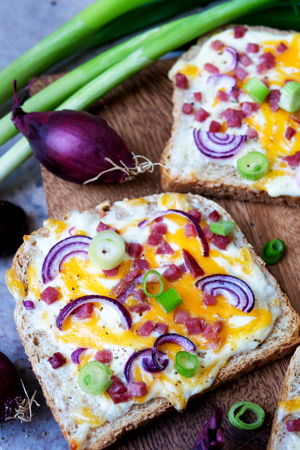 Flammkuchen toast with bacon, onions and sour cream in the Alsatian style