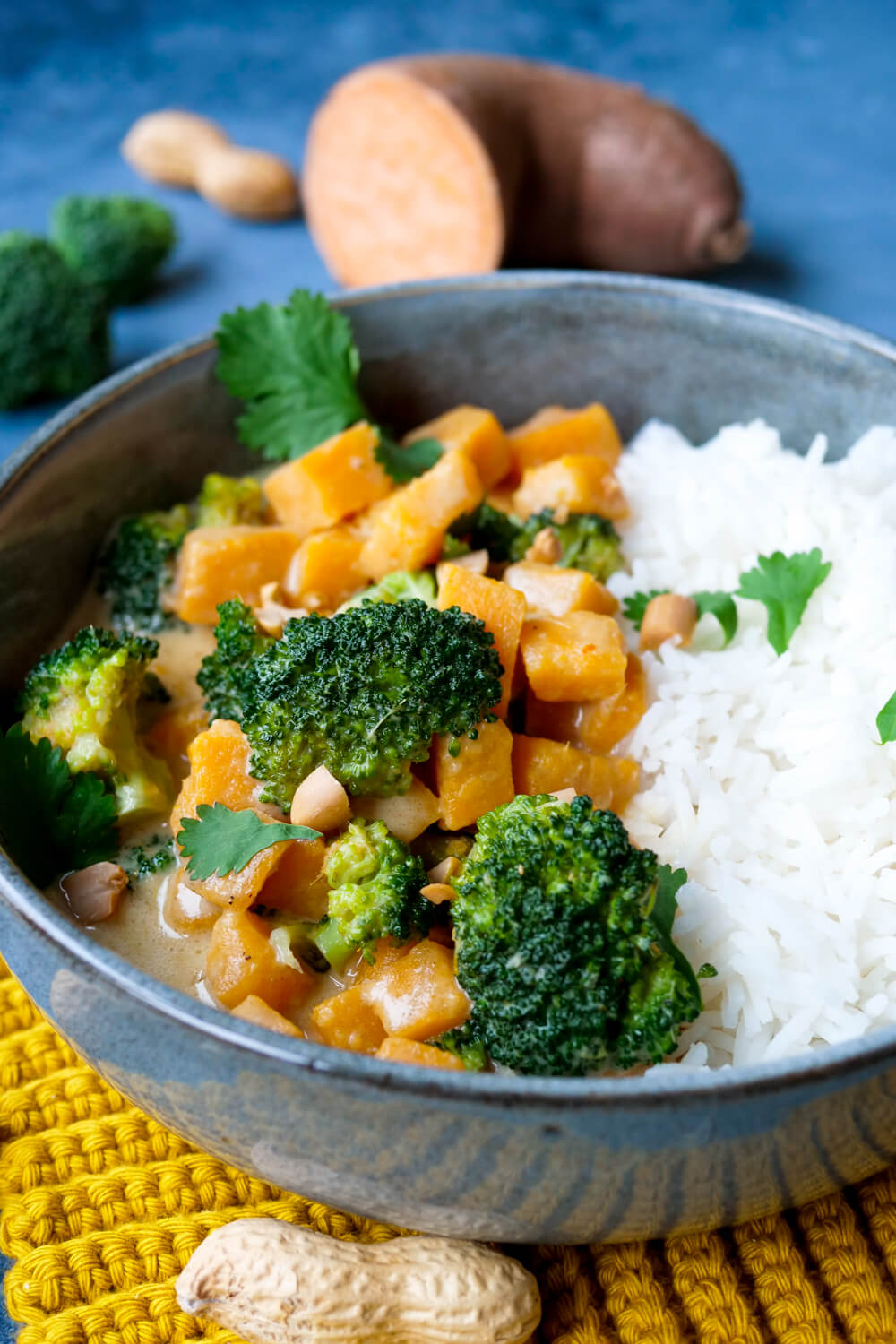 Sweet potato curry with broccoli, coconut milk and rice