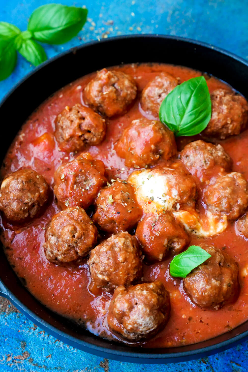 Baked chopping balls in tomato sauce with mozzarella