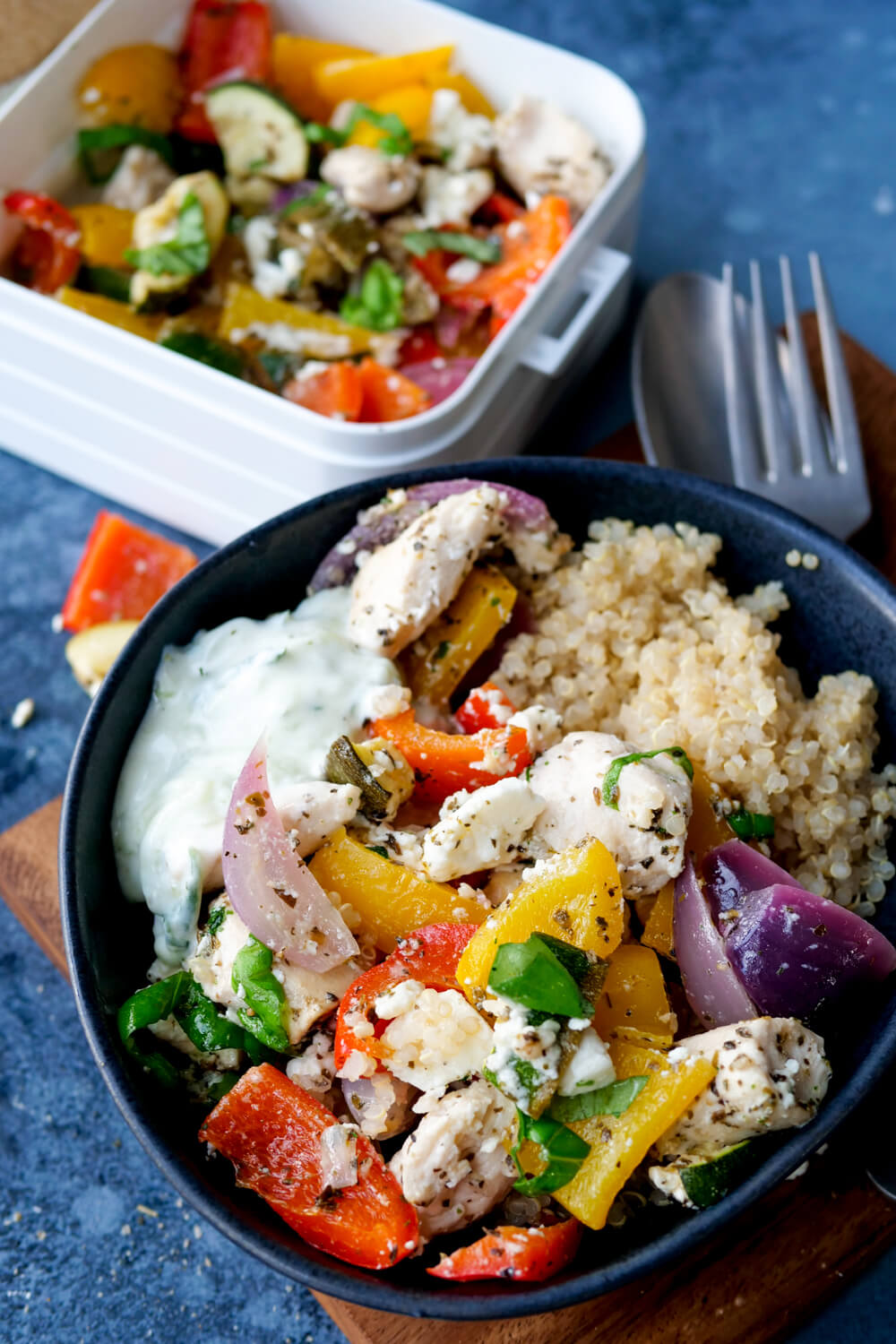 Quinoa bowl with peppers, chicken, onions, feta and tzatziki