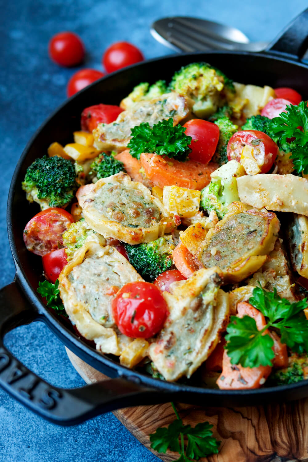 Fried dumplings with vegetables in the pan