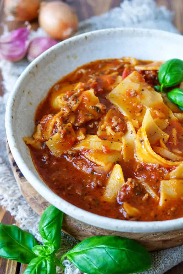 Lasagnial soup with basil in the bowl