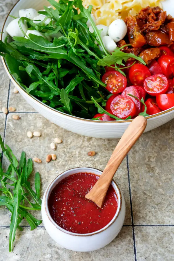 Italian pasta salad with a dressing made of passed tomatoes