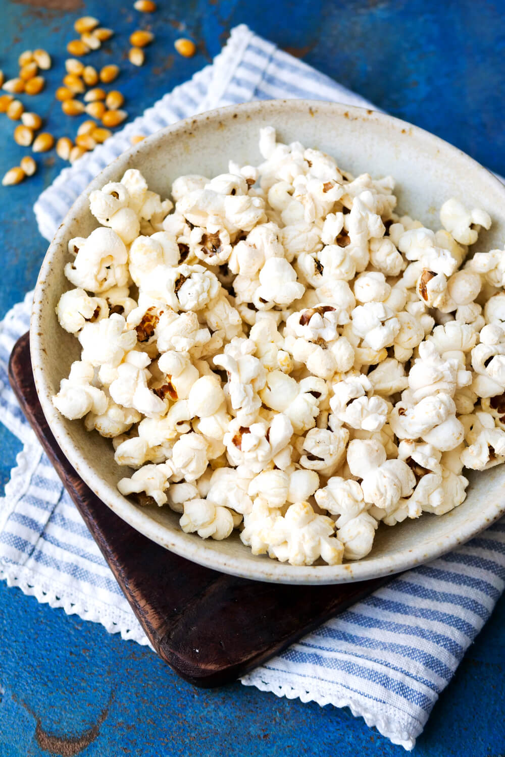 Popcorn from the hot air fryer on a plate.