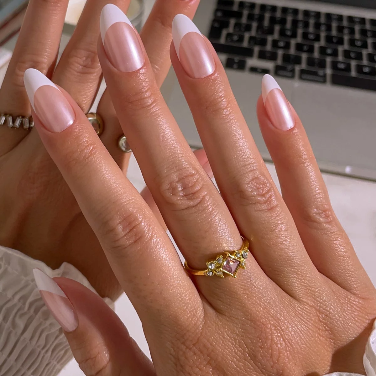 Pink pearl lacquer and white in combination on French nails