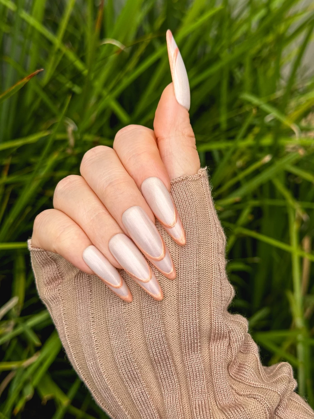 Long French nails in a striking design 