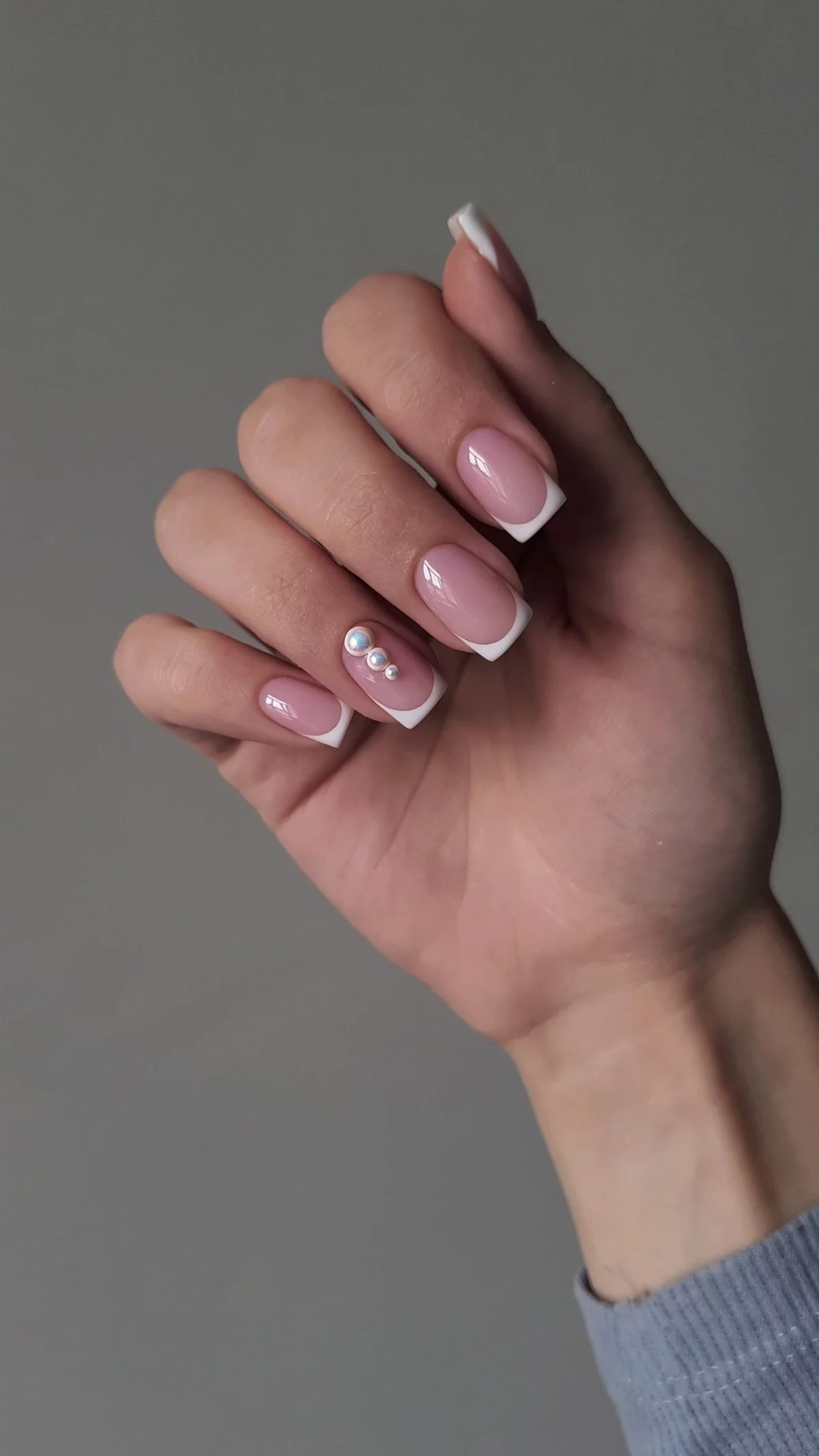 Ornaments on the French nails 