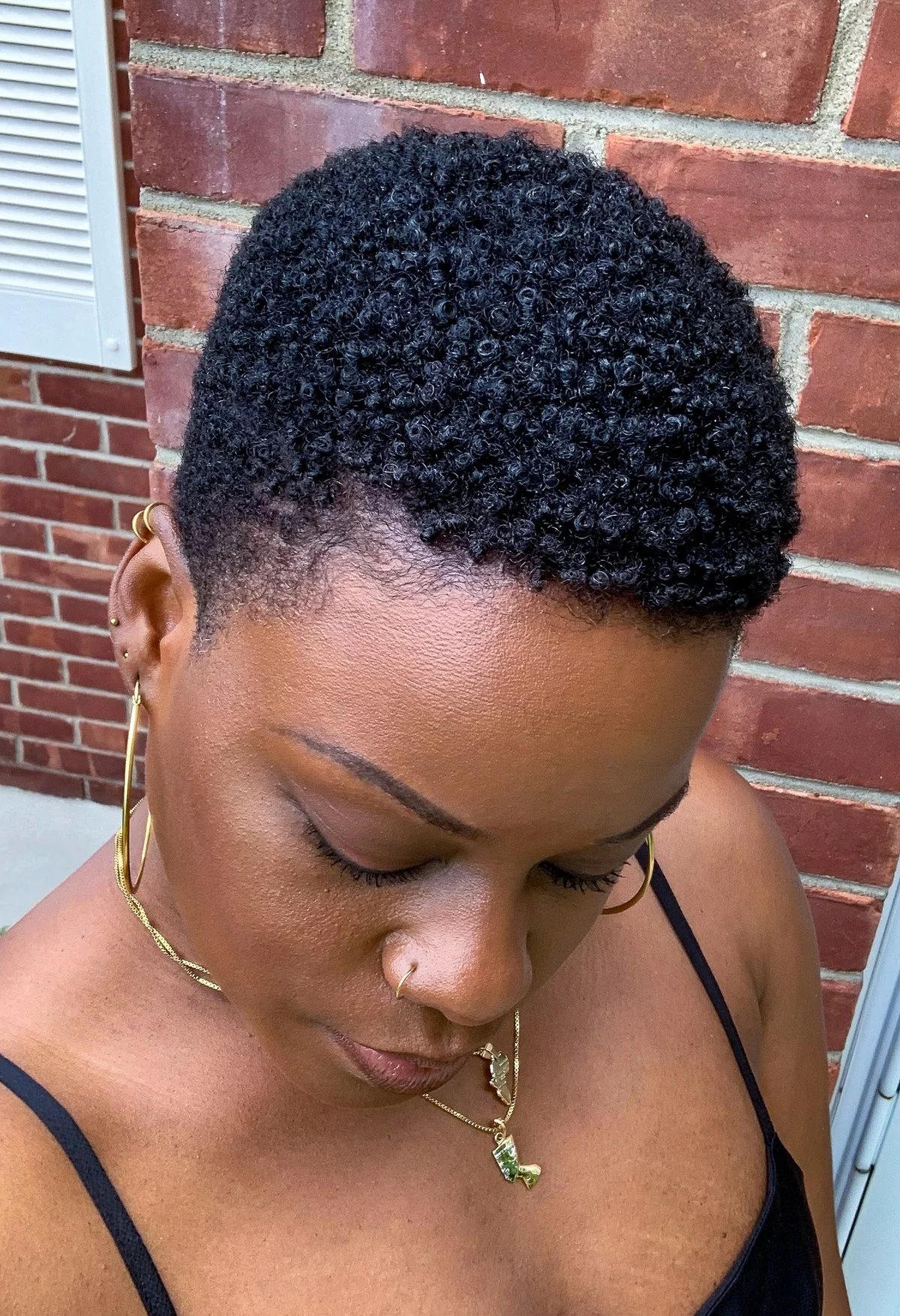 Black curls and short -cut hair