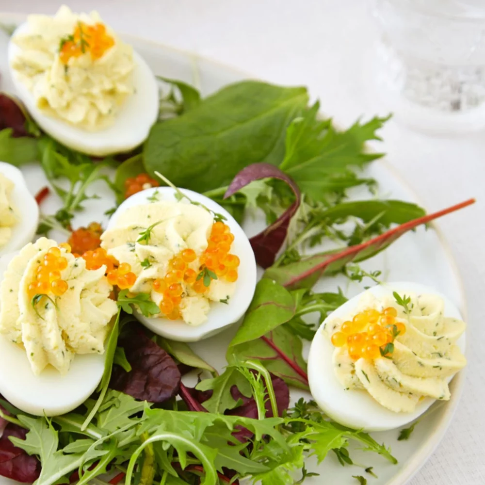 Easter breakfast ideas with deviled eggs and fresh salad