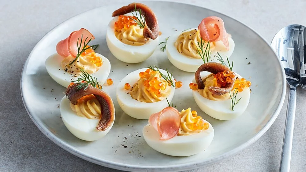 Deviled Eggs with caviar and bacon