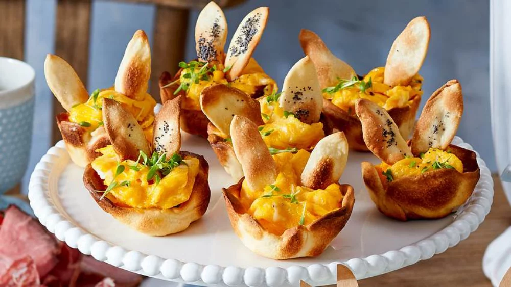 Muffins in rabbit shape with a yellow filling to the Easter breakfast