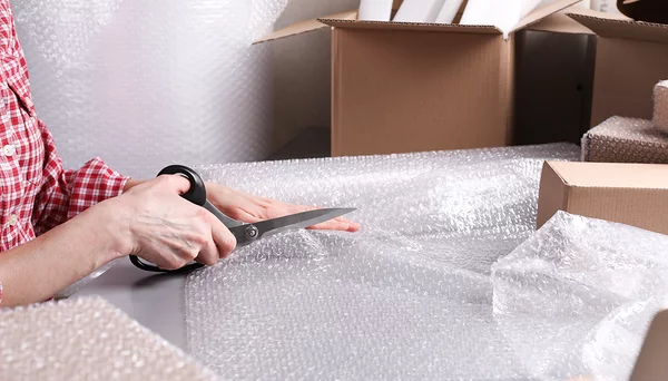 Purchase moving boxes and packaging material for glasses and dishes for free