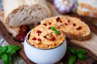 Tomato butter spread to baguette